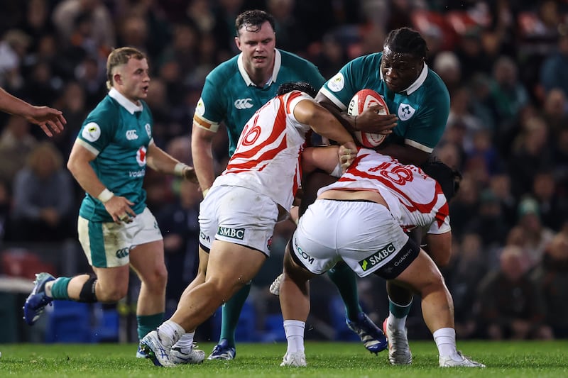 Ireland's Sam Illo is tackled by Japan's Hayate Era and Keijiro Tamefusa. Photograph:  
Ben Brady/Inpho