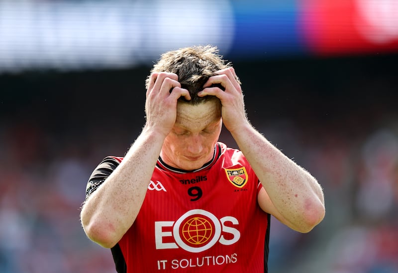 Down's Odhran Murdock dejected after the match. Photograph: James Crombie/Inpho