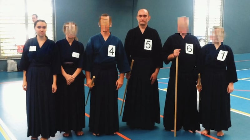 Catherine Mancel (left) with her father Emeric Mancel (centre) at a Japanese fencing competition in Australia. Photograph: Les Nouvelles Calédoniennes