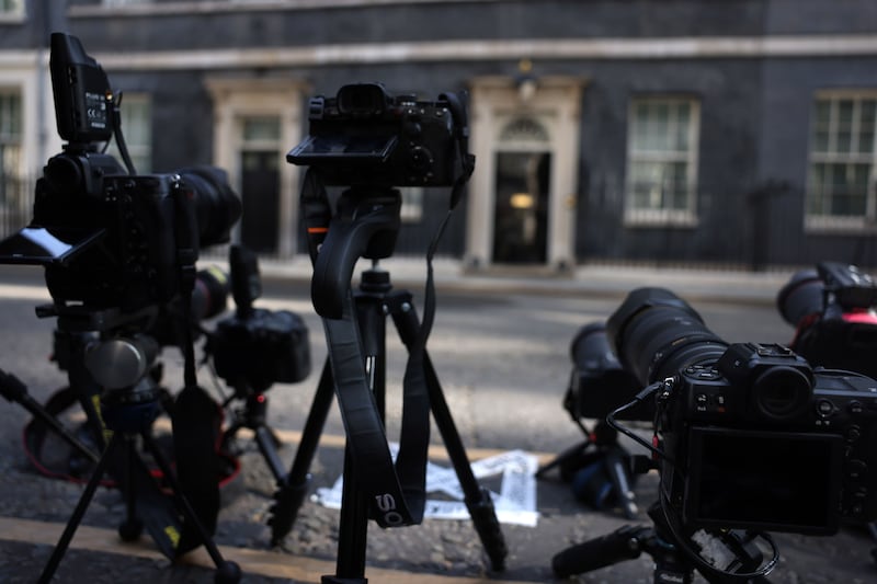 Remote cameras are placed at Downing Street, as members of the media gather in London. Photograph: Neil Hall/EPA