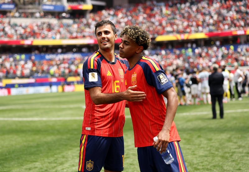 Rodri and Yamal of Spain celebrate after the 2-1 victory over Belgium in the quarterfinal. Photograph: Sarah Stier/Fifa via Getty Images