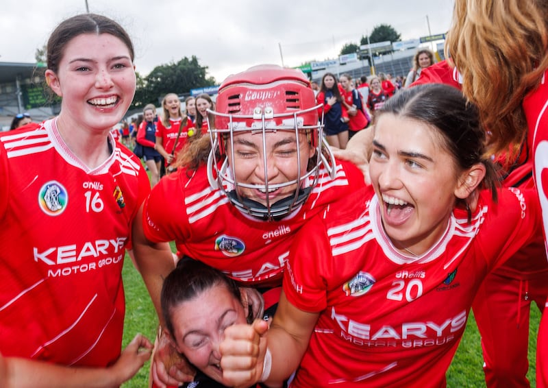 Cork's Anna Kearney, Sorcha McCartan and Niamh McNabola celebrate the victory over Tipperary. Photograph: Tom Maher/Inpho