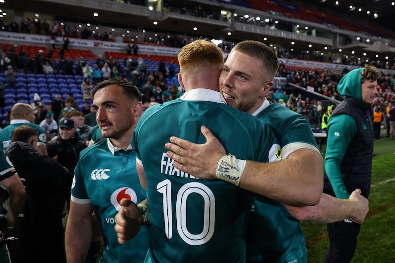Ireland's Sean Jansen celebrates with Ciarán Frawley after the game. Photograph: Ben Brady/Inpho