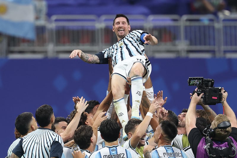 Lionel Messi is lifted by teammates as they celebrate after winning the 2026 World Cup Round of 16 football match between Argentina and Egypt at Atlanta Stadium in Atlanta on July 7, 2026.  Photograph: Odd Andersen/AFP via Getty Images