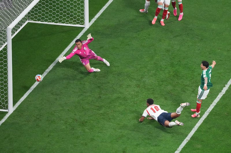 Jude Bellingham scores England's first goal against Mexico. Photograph: Martin Rickett/PA Wire