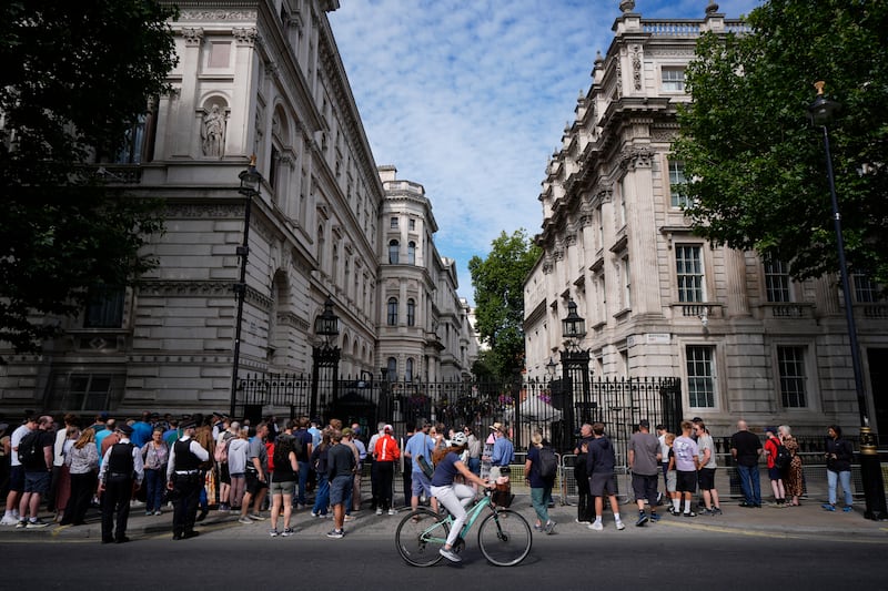 Members of the public outside Downing Street, London. Photograph: Andrew Matthews/PA Wire  