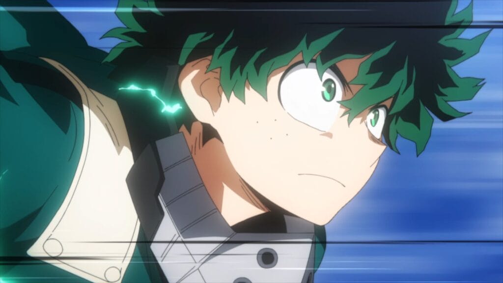 Still from My Hero Academia that depicts Izuku Midoriya, a green-haired boy wearing a green jumpsuit