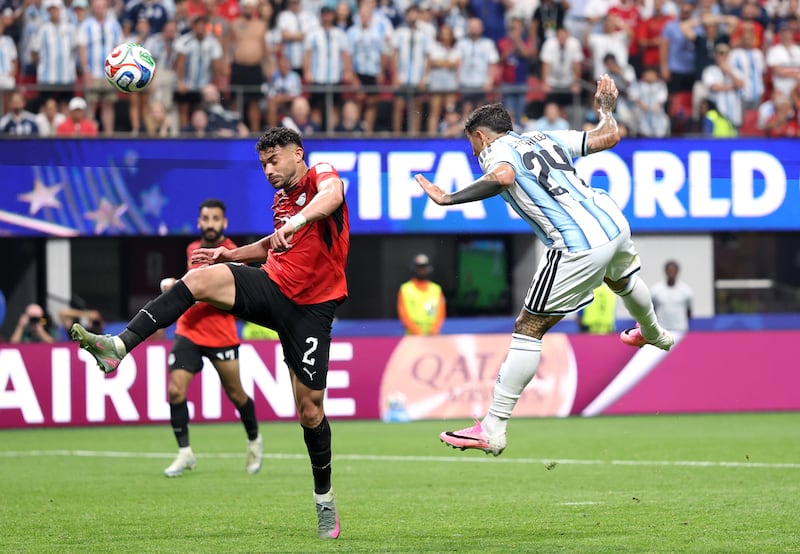 Enzo Fernandez heads in Argentina's winner against Egypt. Photograph: Justin Setterfield/Getty