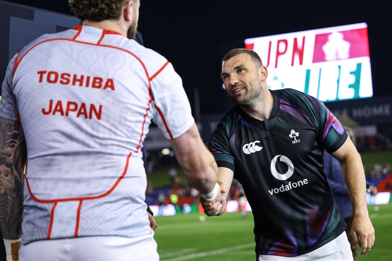 Japan's Warner Dearns and Ireland's Tadhg Beirne during the coin toss. Photograph: Ben Brady/Inpho