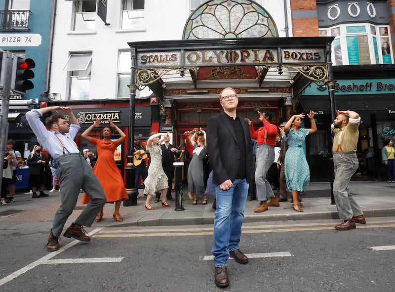 Girl from the North Country: Conor McPherson with the cast of his musical outside the 3Olympia Theatre in Dublin in 2022. Photograph: Leon Farrell/Photocall Ireland