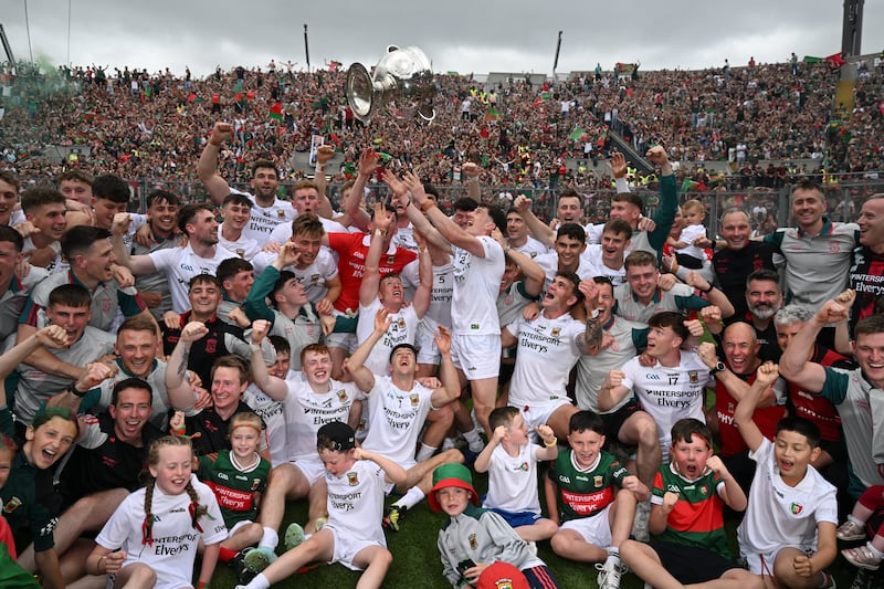 Mayo players celebrate with the Sam Maguire Cup in Croke Park. Photo: Stephen McCarthy/Sportsfile via Getty Images