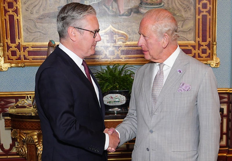 British King Charles III welcomes outgoing prime minister Keir Starmer, during an audience at Buckingham Palace, London. Photograph: Aaron Chown/ Getty Images