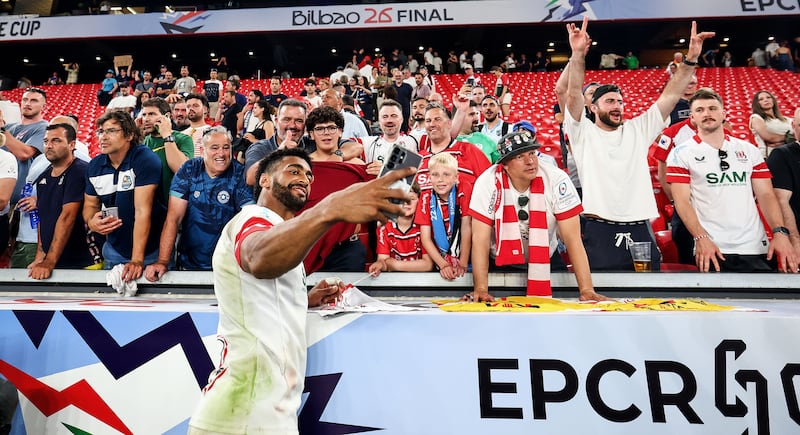 Ulster’s Robert Baloucoune takes a selfie with fans after the Challenge Cup final against Montpellier at San Mames Stadium, Bilbao, in May. Photograph: James Crombie/Inpho