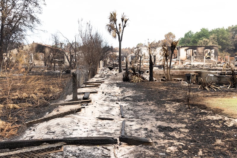Damaged properties following wildfires in Le Porge, France, on Thursday. Photograph: Sophie Garcia/EPA