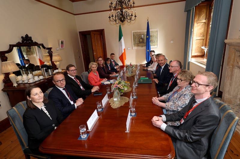 European Commission president Ursula von der Leyen and Taoiseach Micheál Martin with officials during a plenary session. Photograph: EPA