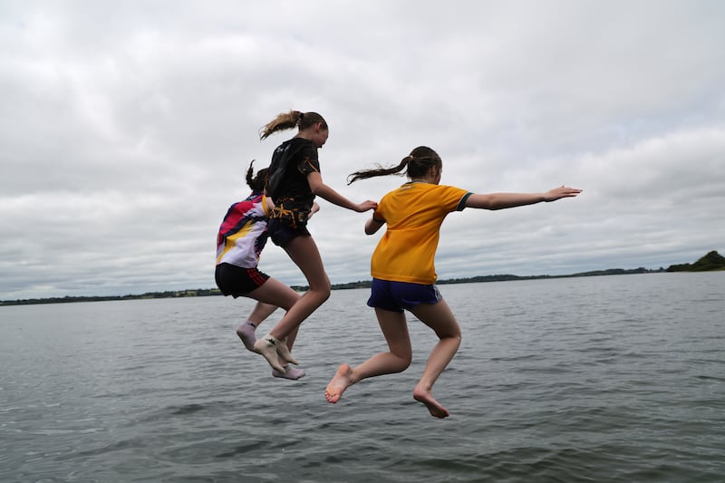 Orlaith Hanley, Shaynah Mitchell and Lola Yore cool off in Lough Owel, Co Westmeath on Thursday. Photograph: Bryan O’Brien/The Irish Times