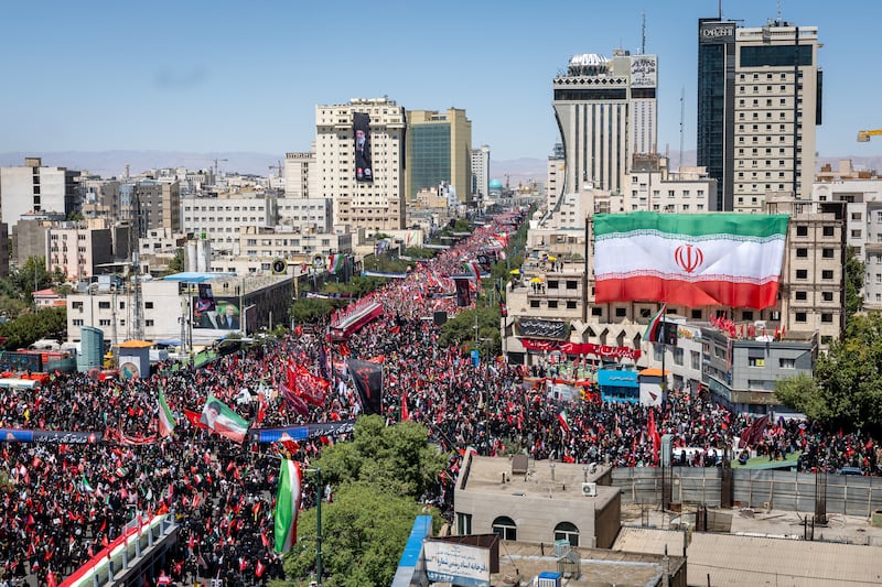 Thousands of mourners await the arrival of the body of Iran's slain supreme leader Ayatollah Ali Khamenei on Thursday in Mashhad, Iran. Photograph: John Moore/Getty Images