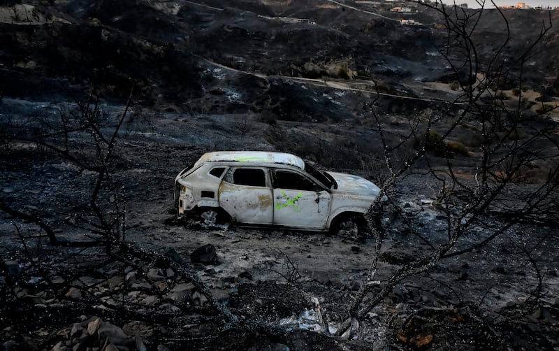 A burned car lies in an area affected by a wildfire near Bedar, in the Almeria province of Spain, on Friday. Photograph: Jose Jordan/AFP via Getty
