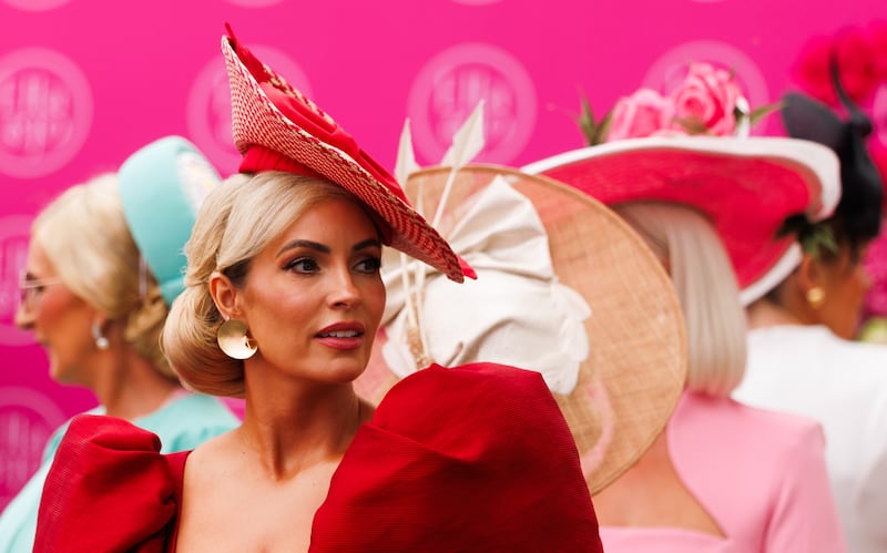 Pam Richardson from Galway with matching red dress and headwear. Photograph: James Crombie/Inpho