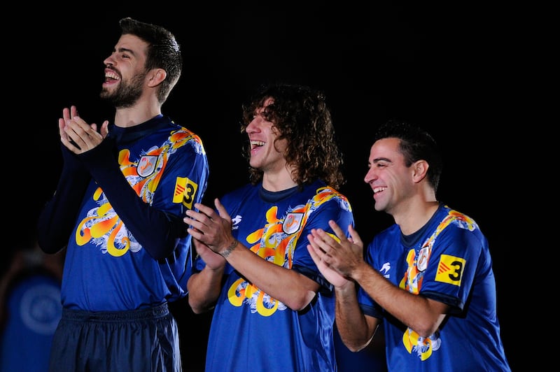 Gerard Piqué, Carles Puyol and Xavi Hernández played for Catalonia in a friendly match against Nigeria in 2013. Photograph: David Ramos/Getty Images