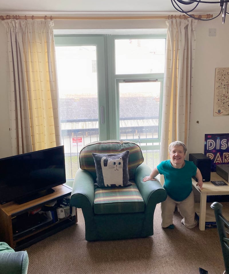 Elizabeth in her livingroom before renovations