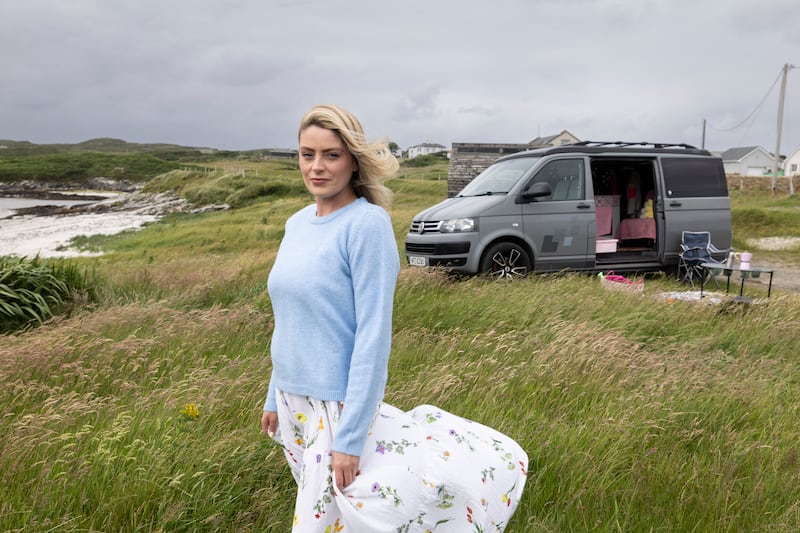 Jessica Strawbridge, from Derry, with her campervan beside Rossbeg Beach, Co Donegal. Photograph: Joe Dunne 