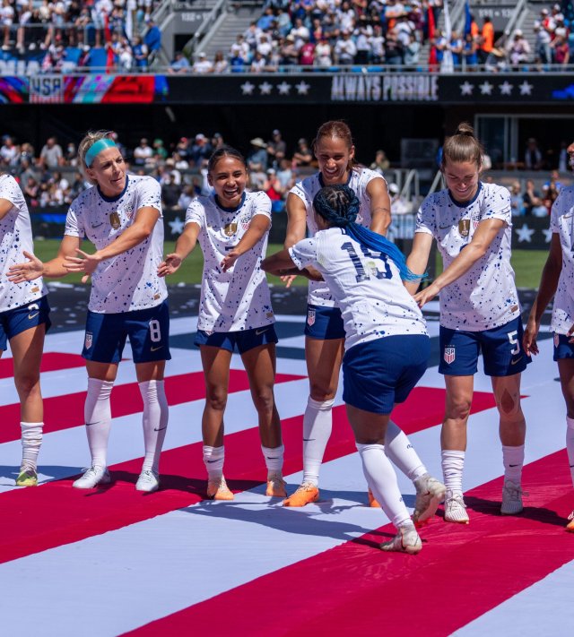 SAN JOSE, CA - JULY 9: Crystal Dunn #19 of the United States high fives her teammates after a game between Wales and USWNT at PayPal Park on July 9, 2023 in San Jose, California. (Photo by Brad Smith/USSF/Getty Images for USSF).