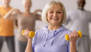 Senior Group Exercising With Weights
