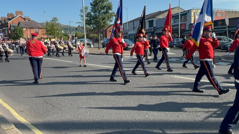 People take part in an Orange Order parade in Belfast, as part of the Twelfth of July celebrations. Photo: Rebecca Black/PA