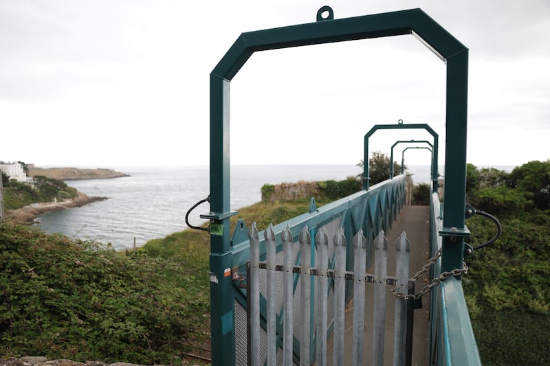 A pedestrian bridge over the rail line has been locked off. Photograph: Enda O'Dowd