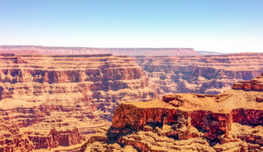 The Grand Canyon looks vast until you set it beside Valles Marineris on Mars, a single rift so long it would stretch clear across the United States and in places plunges up to seven kilometres deep, making it the largest canyon in the solar system