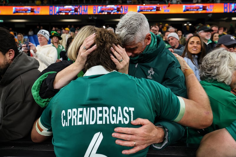 Ireland's Cian Prendergast celebrates with his parents Ciara and Mark after the match. Photograph: Ben Brady/Inpho