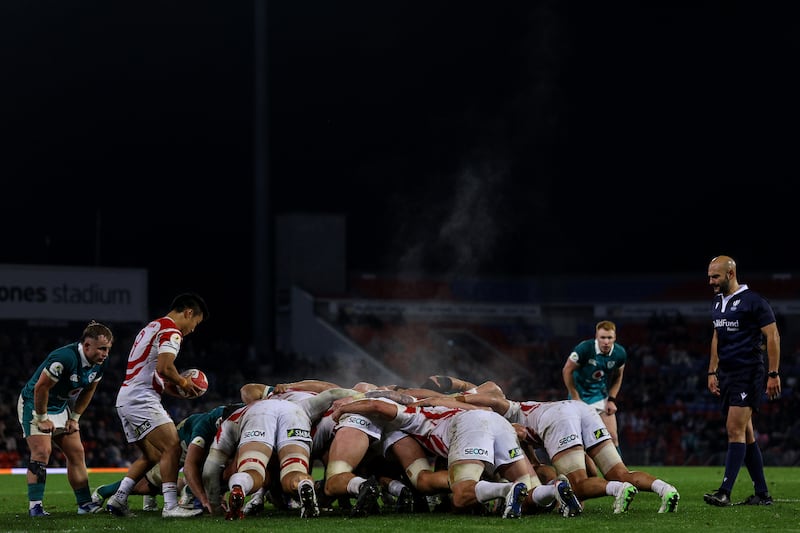 Japan's Naoto Saito prepares to feed the ball into a scrum. Photograph: Ben Brady/Inpho