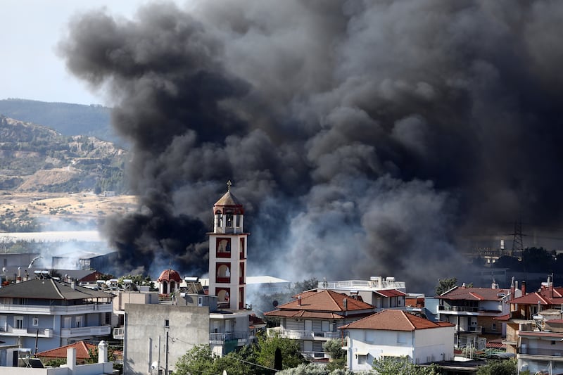 Thick smoke rises above the village of Filothei during a wildfire on the outskirts of the northern city of Thessaloniki, Greece. Photograph: Giannis Papanikos/AP