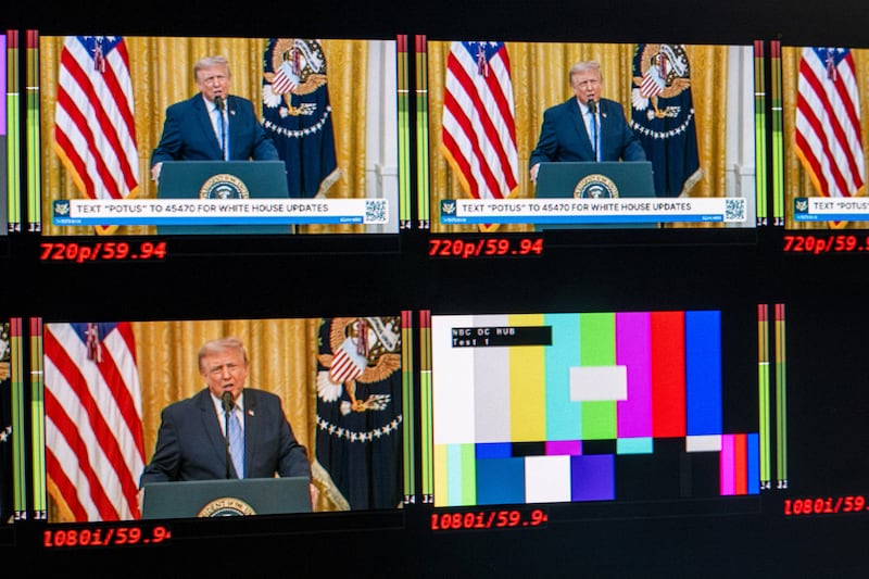 Monitors display US president Donald Trump during a prime-time address. Photographer: Aaron Schwartz/UPI/Bloomberg