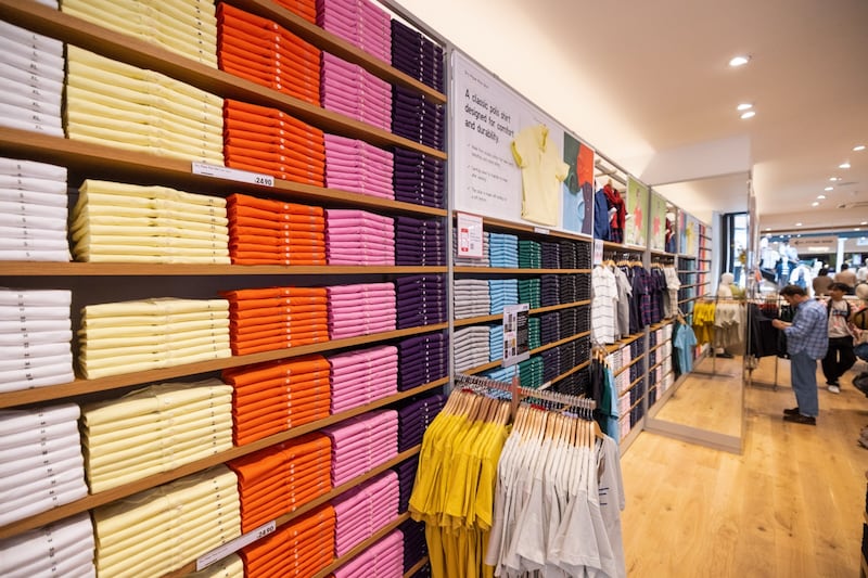 T-shirts for sale at a Uniqlo store in London. The chain is known for its range of basic clothing in a wide range of colours and cuts. Photograph: Chris Ratcliffe/Bloomberg