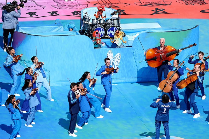 World Cup half-time show: Animal performing with The Muppets band Electric Mayhem and  Venezuelan conductor Gustavo Dudamel, who led an orchestra of ‌musicians ‌from ​New York and Venezuela. Photopgraph: Kevin C Cox/Getty Images