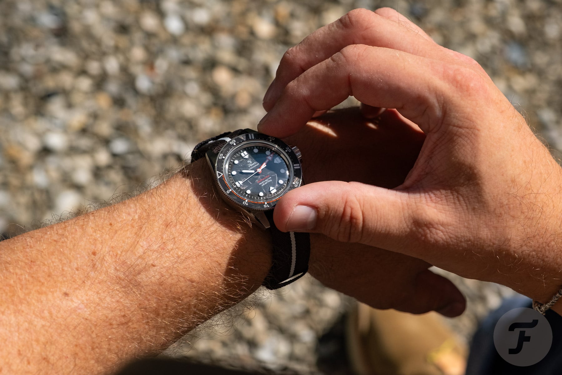 Yema Navygraf Barracuda CMM.20 Limited Edition on wrist, fingers on bezel