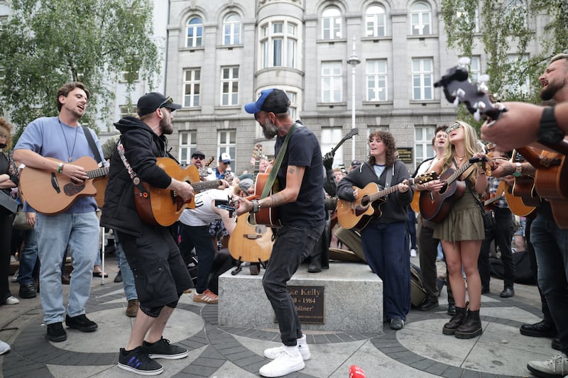 The Dublin busking community turned out to pay tribute to Glen Hansard. Photograph: Enda O'Dowd