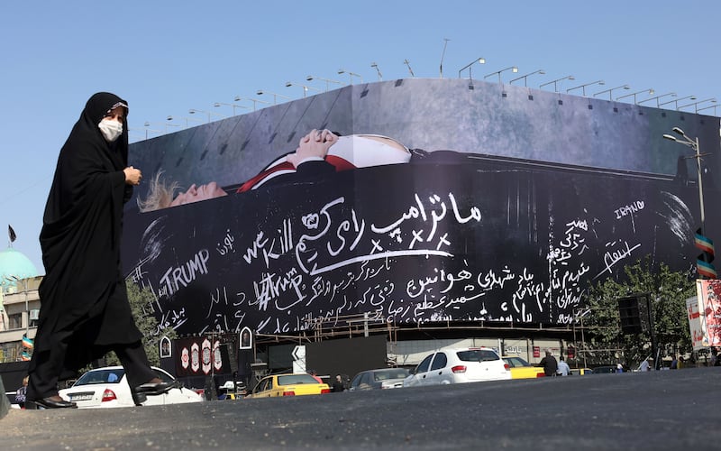 An anti-US billboard depicting US president Donald Trump in a coffin, accompanied by a sentence in Persian that reads: "We kill Trump" displayed at the Enghelab Square in Tehran, Iran. Photograph: EPA
