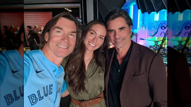 Jerry O'Connell, Caitlin McHugh, and John Stamos smiling together