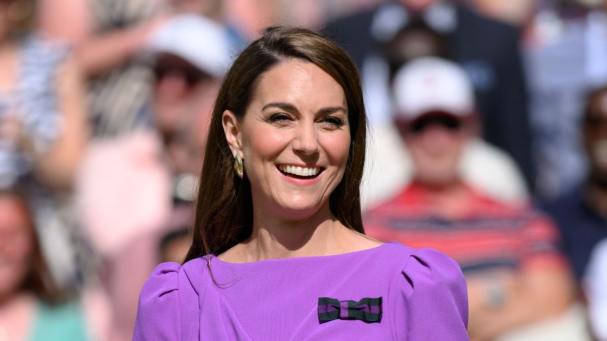 Kate Middleton and brother James hold hands as they complete Three Peaks Challenge for cancer charity