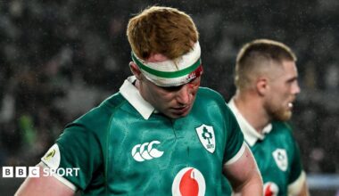 Ciaran Frawley looks to the ground after Ireland's loss against New Zealand