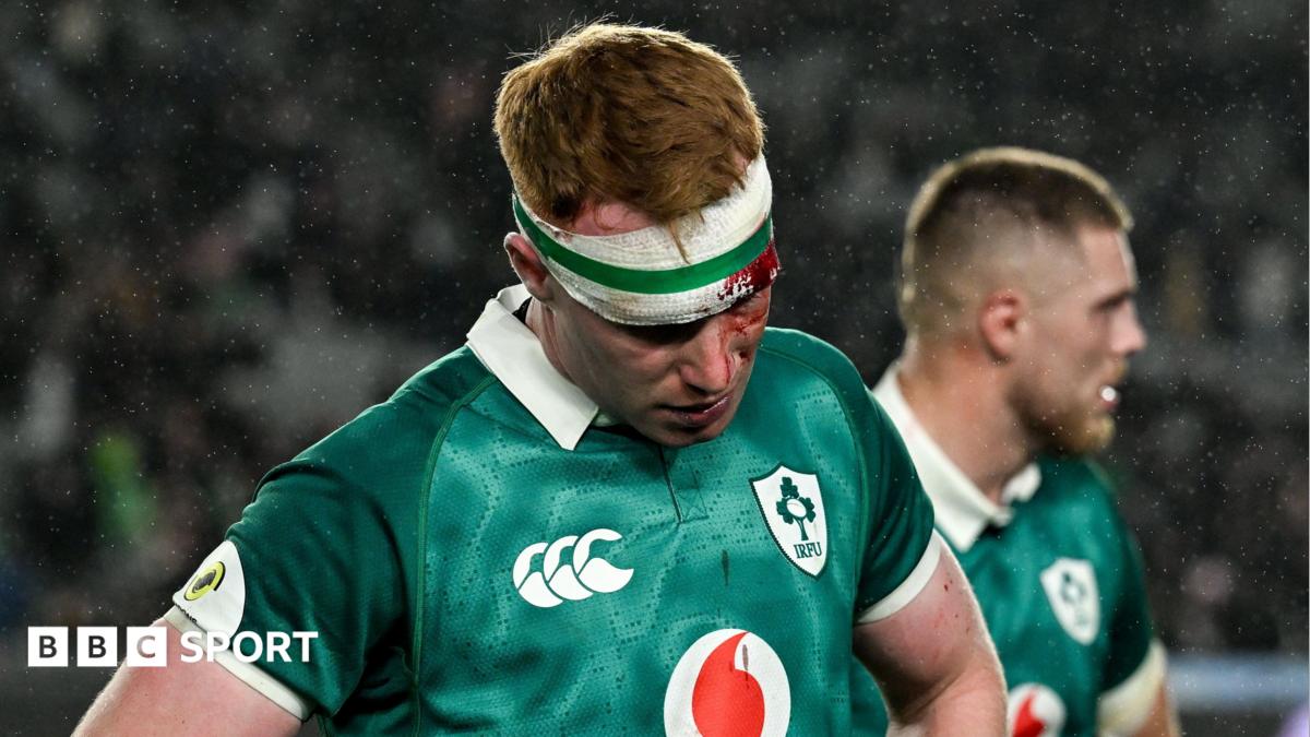 Ciaran Frawley looks to the ground after Ireland's loss against New Zealand