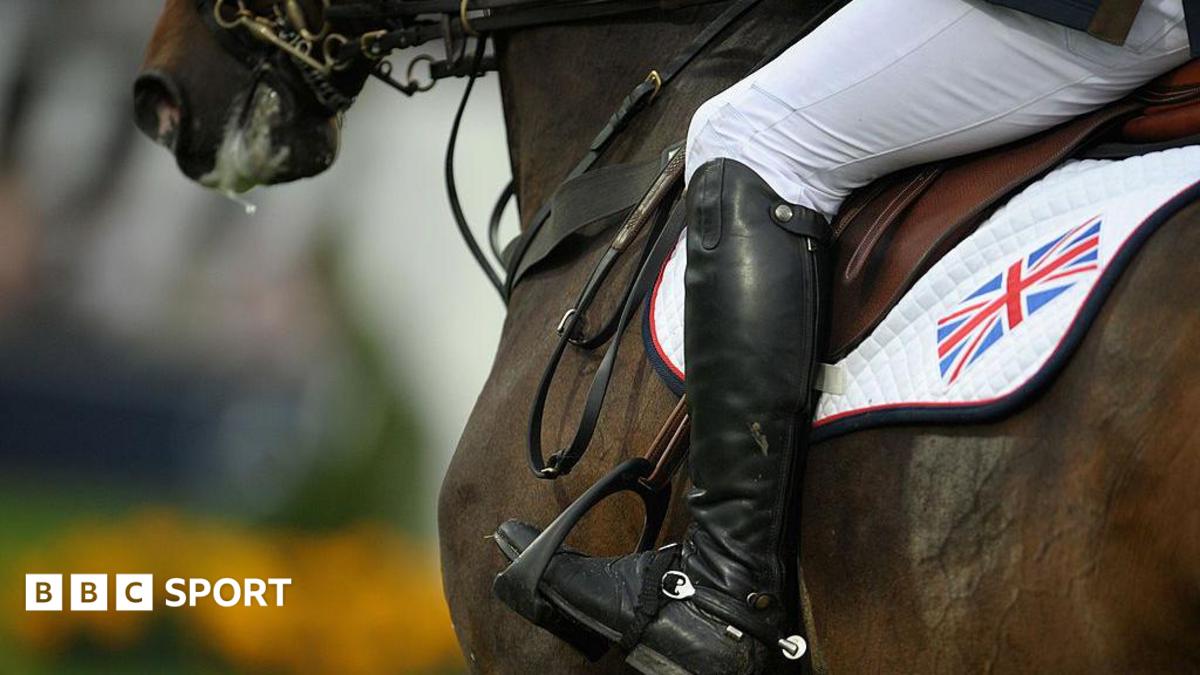 A close up of a horse and rider in action at an eventing competition