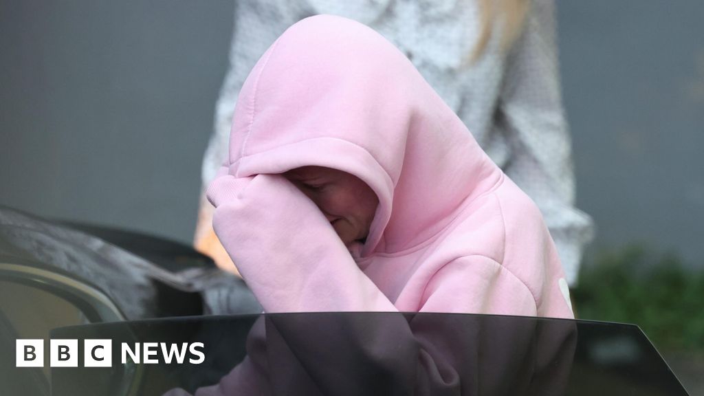 Two charged over bomb back in court as law student accused faces bail delay - BBC