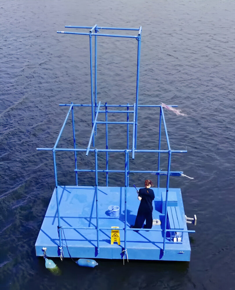 an endless act of cleaning unfolds on a floating platform in berlin - 1