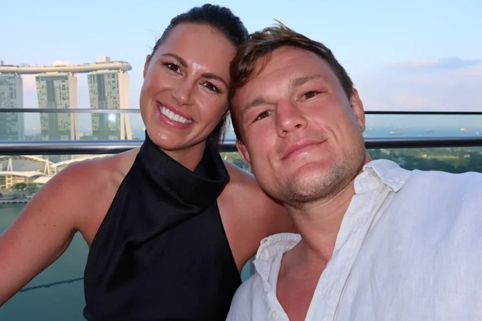 Danika and her partner Liam in Singapore.