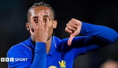 Joao Pedro partly covers his face with his hand