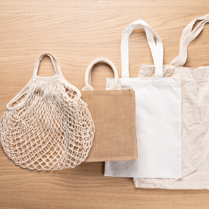 things-to-remove-from-counters a collection of reusable bags on a wooden surface